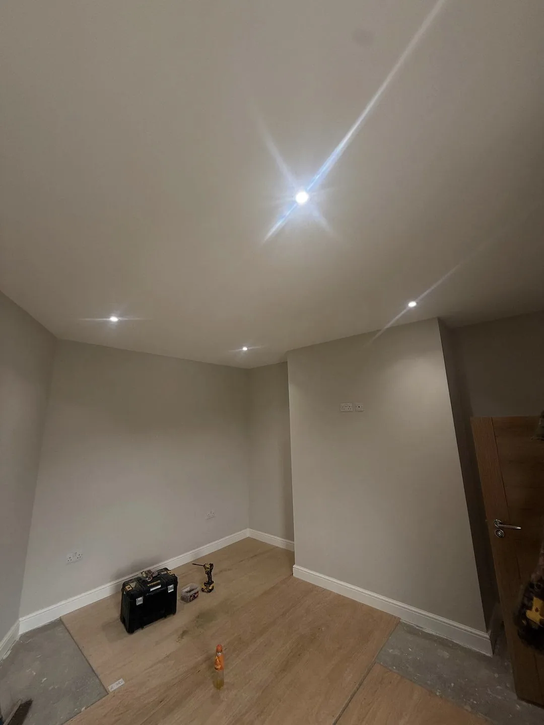 Bedroom with new downlights and sockets after rewiring