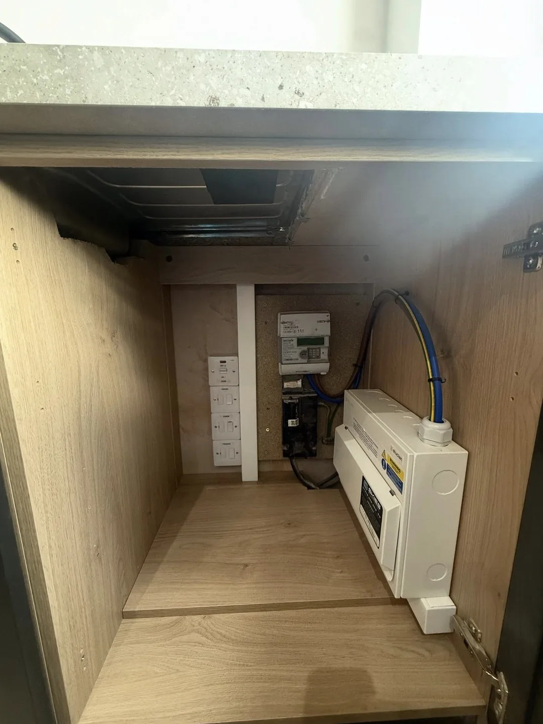 New consumer unit and meter housed in the utility cupboard