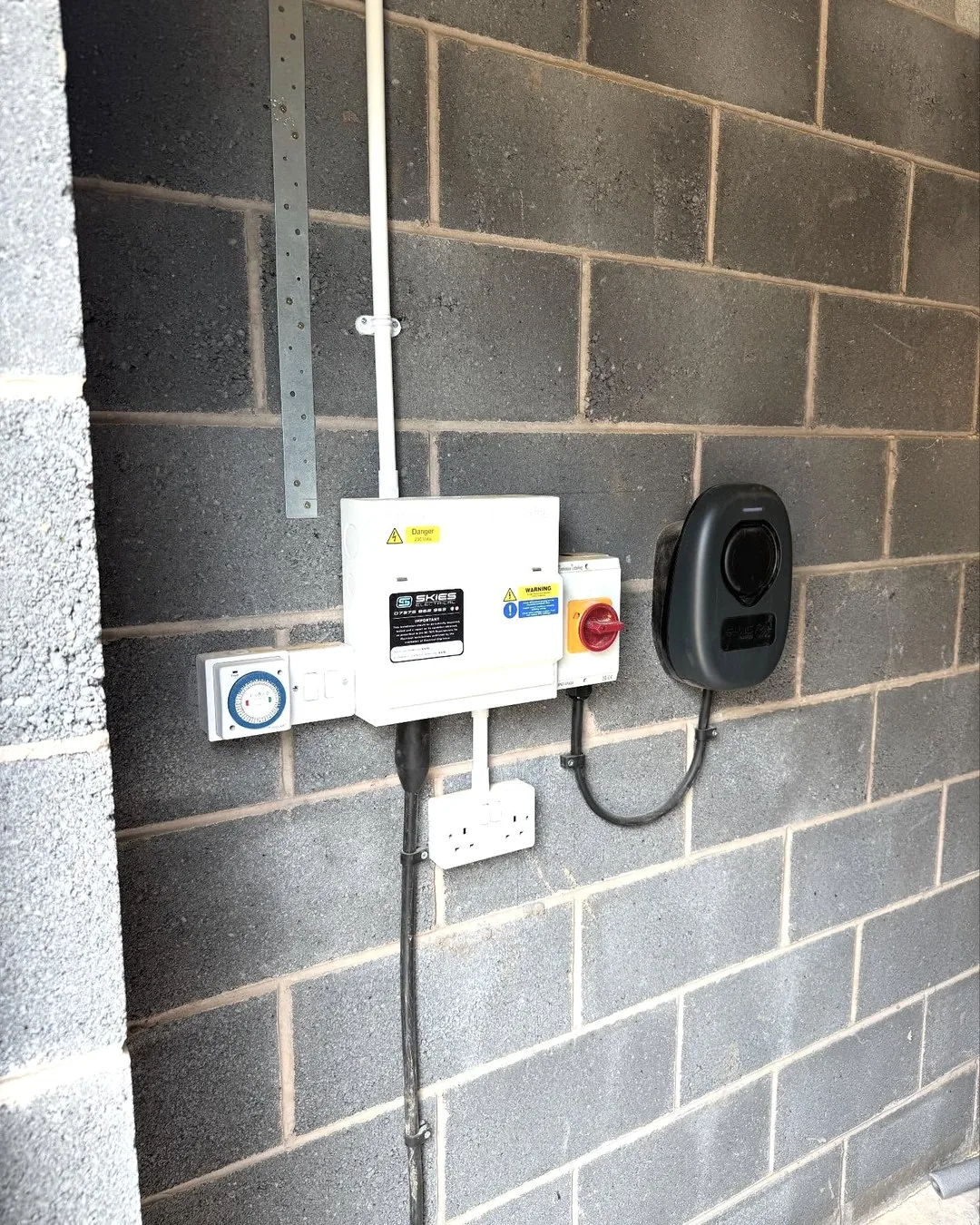 Electrical equipment and EV charging point installed in the garage