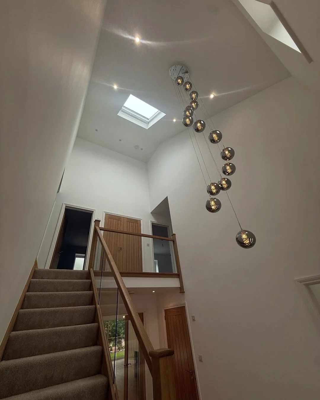 Feature pendant lighting above the staircase